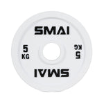 The SMAI Calibrated Weight Plates - 5kg (Pair) are white cast iron plates featuring a large center hole, "5 KG" in black text on both sides, and "SMAI" branding at the top and bottom—perfect for precision training.