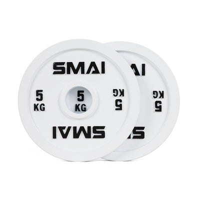 A pair of SMAI Calibrated Weight Plates - 5kg, featuring white cast iron with "SMAI 5 KG" in black text, are stacked together with one plate slightly in front.