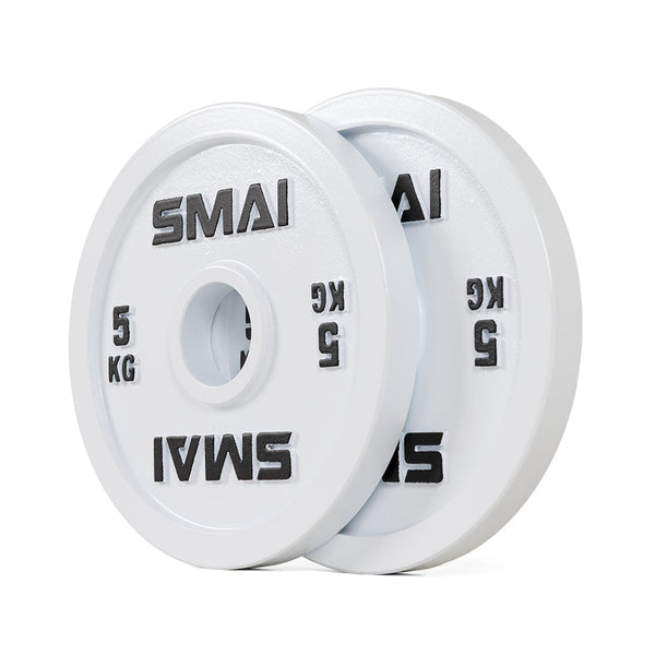 A pair of SMAI Calibrated Weight Plates - 5kg each, white with "SMAI" and "5 KG" in black text, are standing upright and leaning against each other on a white background.