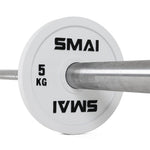Close-up of a silver barbell with a white 5kg Calibrated Weight Plate by SMAI, featuring the logo in both orientations. The SMAI Calibrated Weight Plate is securely fixed, perfect for precise lifting sessions.
