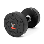 A pair of SMAI Commercial Round Dumbbells, black with metal handles and "SMAI 15 KG" labels on the ends, are shown on a white background—perfect durable weights for any home gym.