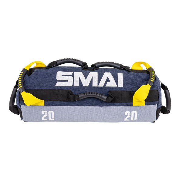 The SMAI Sand Bags - Hybrid Range in blue and gray features the number "20" and multiple black and yellow handles, offering versatile grip options—perfect for strength and endurance training.