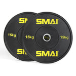 A pair of black 15kg HD Bumper Plates from Sale Item are stacked together, highlighting their sleek design with yellow lettering and high-quality rubber finish, making them an excellent addition to any gym equipment collection.