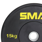 A close-up of the SMAI HD Bumper Plates (Pair) - 15kg, a gym essential made from high-density rubber with a silver center hole and "15kg" in yellow on the left side.
