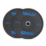 Two black HD Bumper Plates marked "Sale Item" and weighing "20 kg" each are stacked slightly offset, perfect for Olympic lifting or CrossFit. The plates have a central hole for easy mounting on a barbell.