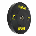 The SMAI Home Gym Bumper Plates - 15kg (Pair) feature a black design with "SMAI" and "15 KG" in yellow, metal center rings, and are perfect for home gyms. Shown angled against a white background.
