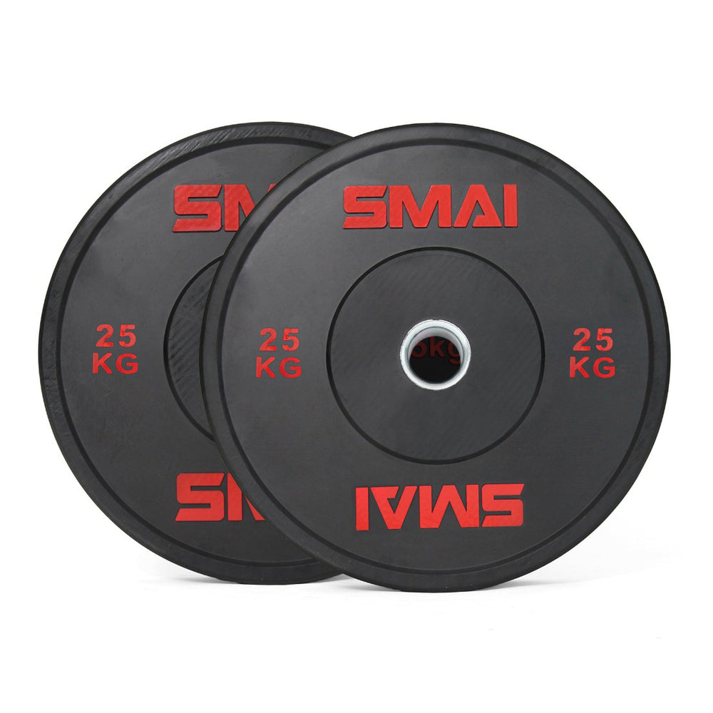 The SMAI Home Gym Bumper Plates - 25kg (Pair) feature red SMAI branding and are perfect for any home gym setup, offering affordability and quality for your strength training needs.