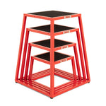 The SMAI Steel Plyo Box Set - 4 Pack Stackable features durable red boxes with black platforms and open sides, ideal for jump training and exercise.
