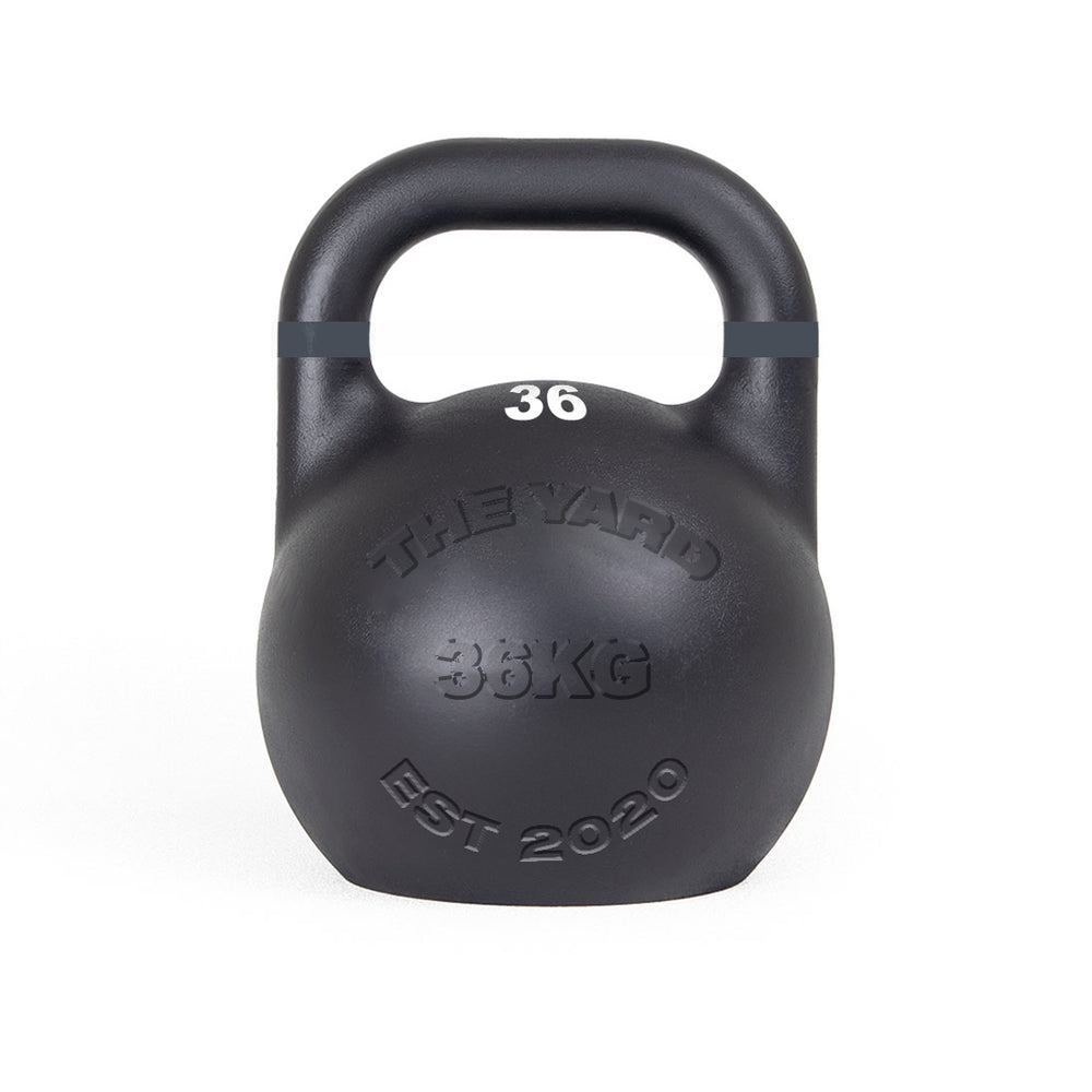 The SMAI The Yard - Competition Steel Kettlebell 36kg is black with "THE YARD," "EST 2020" custom embossing on the front and "36" in white near the handle, shown against a white background.