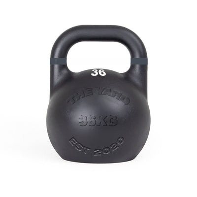 The SMAI The Yard - Competition Steel Kettlebell 36kg is black with "THE YARD," "EST 2020" custom embossing on the front and "36" in white near the handle, shown against a white background.
