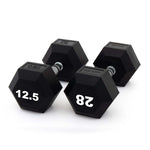 Two SMAI The Yard Rubber Hex Dumbbells (12.5kg pair) are shown on a white background. They feature black hexagonal heads with silver, textured ergonomic handles, ideal for commercial gyms.