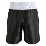 The SMAI Boxing Competition Shorts - Black feature shiny satin polyester and an extra-wide white elastic waistband, ensuring comfort and performance in the ring. Shown against a plain white background.