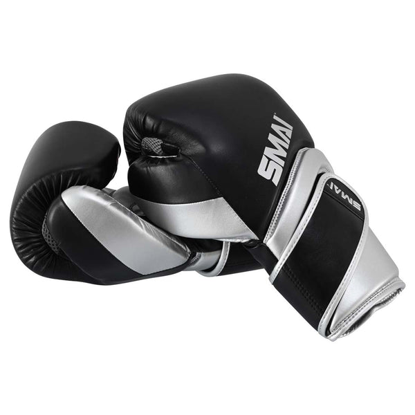 Two black and silver SMAI Silver Series Boxing Gloves with wrist support resting against each other.
