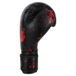 SMAI Essentials Kids Boxing Glove - Red/Black Dragon, featuring black boxing gloves with a red paint splatter pattern and a black dragon graphic on the side.