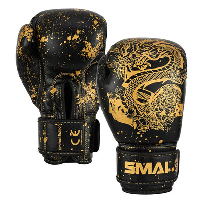 A pair of Essentials Kids Boxing Glove - Black/Gold Dragon, featuring black boxing gloves with gold dragon illustrations, gold stitching, and speckle patterns.