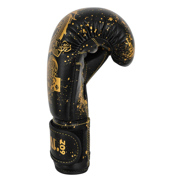 SMAI Essentials Kids Boxing Glove - Black/Gold Dragon featuring gold dragon illustrations, gold paint splatter details, and “6oz” printed on the wrist strap.