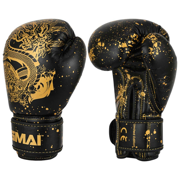 Two black SMAI Essentials Kids Boxing Glove - Black/Gold Dragon gloves featuring gold dragon artwork and gold paint splatter detailing.