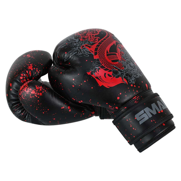 SMAI Essentials Kids Boxing Glove - Red/Black Dragon featuring red dragon graphics and a speckled red paint splatter pattern.