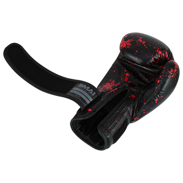 SMAI Essentials Kids Boxing Glove - Red/Black Dragon featuring a black design with a red splatter pattern and an open hook-and-loop wrist strap for added support.