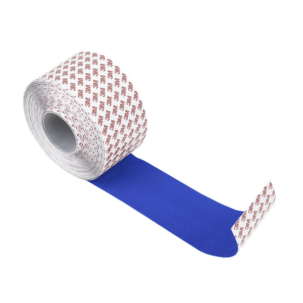 The Dollamur Flexi-Roll Tatami Seam Tape in royal blue by SMAI is shown partially unrolled, revealing its tatami-textured surface and a white backing printed with red text.