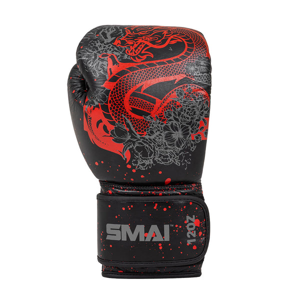 The Boxing Glove - Black Dragon Limited Edition by SMAI features black cowhide leather, bold red dragon and floral designs, "SMAI" and "12 OZ" in silver on the wrist strap, and injection moulded padding for protection.