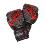 The SMAI Boxing Glove - Black Dragon Limited Edition is crafted from black cowhide leather with red and gray dragon and floral designs, visible brand name on the wrist straps, and injection moulded for superior protection and durability.