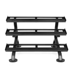 The SMAI 3 Tier Dumbbell Rack - Heavy Duty Commercial Grade features three open rectangular shelves and sturdy legs, perfect for organizing or displaying a rubber hex dumbbell set. Black metal construction shown from the front.
