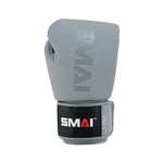 The Elite85 Boxing Glove - Charcoal by SMAI features a charcoal grey injection-molded design with "SMAI" printed in white on the top and on a black patch near the wrist strap.