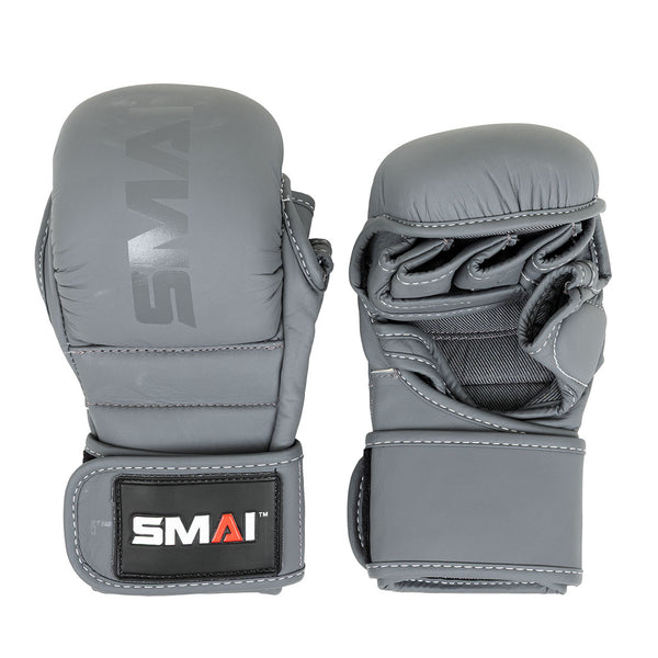 The SMAI Elite85 MMA Hybrid Sparring Glove in charcoal features visible stitching, padded knuckles, open fingers, adjustable wrist straps, and displays the SMAI logo in white, red, and black on the wrist area.