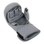 The SMAI Elite85 MMA Hybrid Sparring Glove in charcoal features white stitching, an open palm, and a Velcro wrist strap—perfect as versatile hybrid or sparring gloves. Shown on a white background.