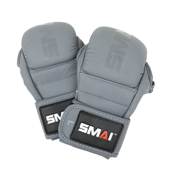 A pair of Elite85 MMA Hybrid Sparring Gloves in charcoal by SMAI, featuring black wrist straps with the white and red "SMAI" logo, are shown overlapping on a white background.