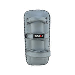 The SMAI Elite85 Muay Thai Pads V2 (Pair) in charcoal have two arm straps, a rear handle, reinforced stitching, impact-absorbing foam edges, and display the SMAI logo in black, white, and red. Made from high-grade leather.