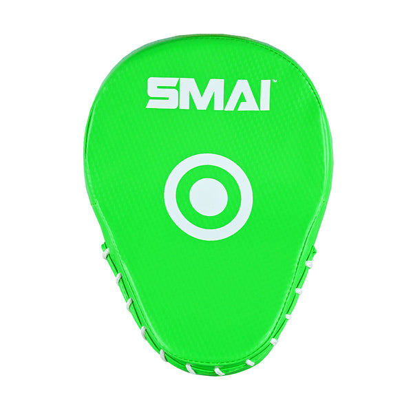 The Essentials Boxing Mitts - Green by SMAI feature a bright green oval design with a white "SMAI" logo and target circle at the center—perfect for Muay Thai training. White stitching accents the sides.