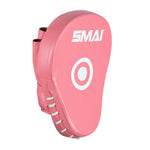 The SMAI Essentials Boxing Mitts - Pink feature a curved design, white laces on the side, a central white target circle, and "SMAI" branding at the top.