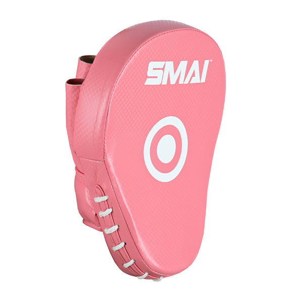 The SMAI Essentials Boxing Mitts - Pink feature a curved design, white laces on the side, a central white target circle, and "SMAI" branding at the top.