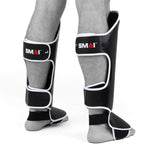 Muay Thai shin guards in step SMAI rear