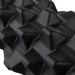 A close-up of the SMAI Foam Roller - Grid from the Bulk 10 Pack highlights its black textured surface, featuring raised triangular ridges that are designed for muscle relief and relaxation.