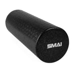 A SMAI Foam Roller - Half Length Firm from the Bulk 10 Pack is shown on its side, featuring a black textured surface and white "SMAI" branding, ideal for muscle recovery and deep tissue massage.