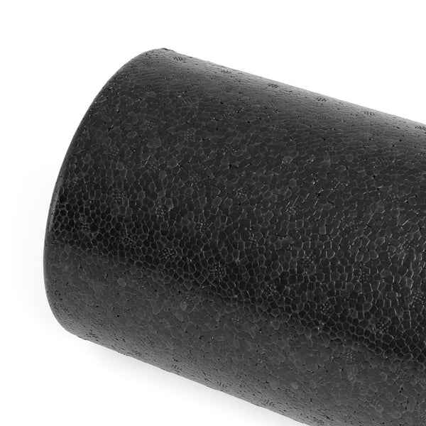 A close-up of the SMAI Foam Roller - Half Length Firm (Bulk 10 Pack), featuring a black, textured surface—perfect for deep tissue massage and muscle recovery, displayed at an angle on a white background.