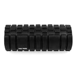 The SMAI The Yard - Foam Roller - Trigger Point 3D is a black, textured foam roller with rectangular ridges and "THE YARD" printed on the side, designed for muscle massage and exercise recovery.