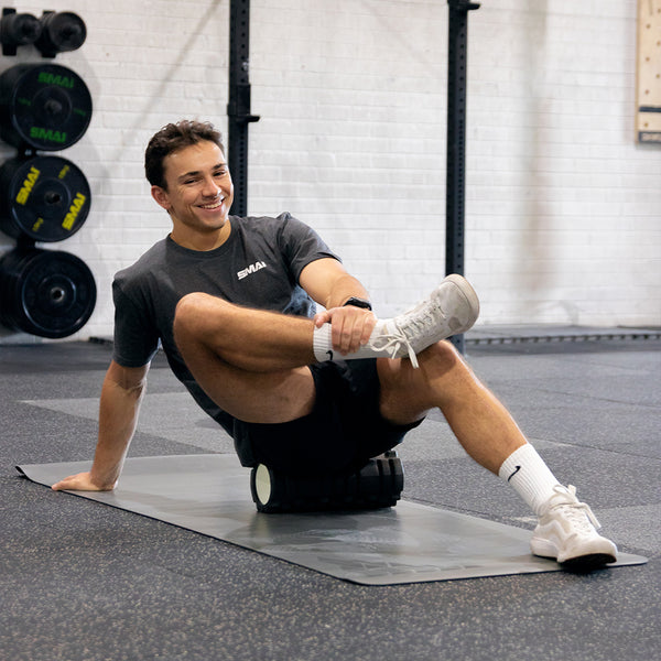 Foam Roller Trigger Point man using for recovery