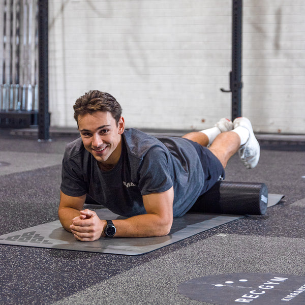 Man using SMAI Foam Roller - Full Length Black