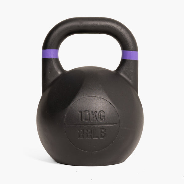The SMAI Competition Kettlebell - Fusion Series in black features a large handle for a comfortable grip, a distinctive purple stripe near the handle, and “10 KG 22 LB” embossed on the front, all set against a white background.
