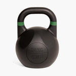 A SMAI Competition Kettlebell - Fusion Series in black with a green stripe near the handle, labeled “24KG” and “53LB,” is positioned upright on a white background.