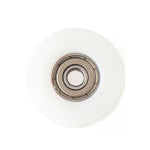 A white circular SMAI Ski Machine Spare Part—Handle Cord Internal Pulley—is shown against a plain white background.