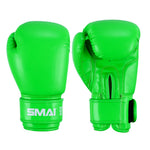The SMAI Essentials Kids Boxing Glove in bright green features "SMAI" and "20 oz" in white on the wrist strap—one glove palm up, the other down. Ideal for kids starting boxing training.