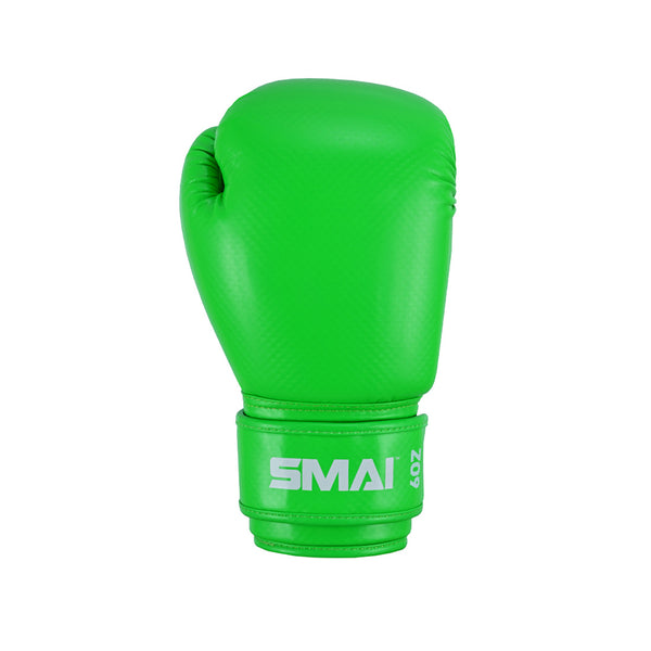 The PRE ORDER: Essentials Kids Boxing Glove - Green by SMAI features "SMAI" and "6 OZ" in white on the wrist strap, provides great wrist support, and is shown on a plain white background.