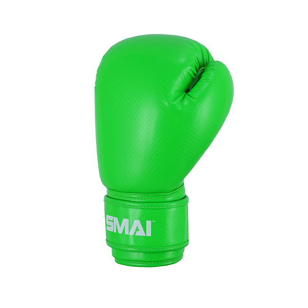 The PRE ORDER: Essentials Kids Boxing Glove - Green by SMAI features a bright green design, white SMAI branding on the wrist strap, and excellent wrist support, displayed against a plain white background.