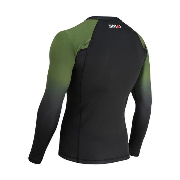 The SMAI Long Sleeve Rash Guard - Olive Green features black fabric on the back and lower sleeves, green on the shoulders and upper sleeves, plus the "SMAI" logo below the collar. Ideal for no-gi BJJ grappling.
