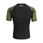 Back view of the SMAI Short Sleeve Rash Guard - Olive Green, featuring a black body, olive green sleeves and shoulders, with the "SMAI" logo displayed near the upper back neckline.